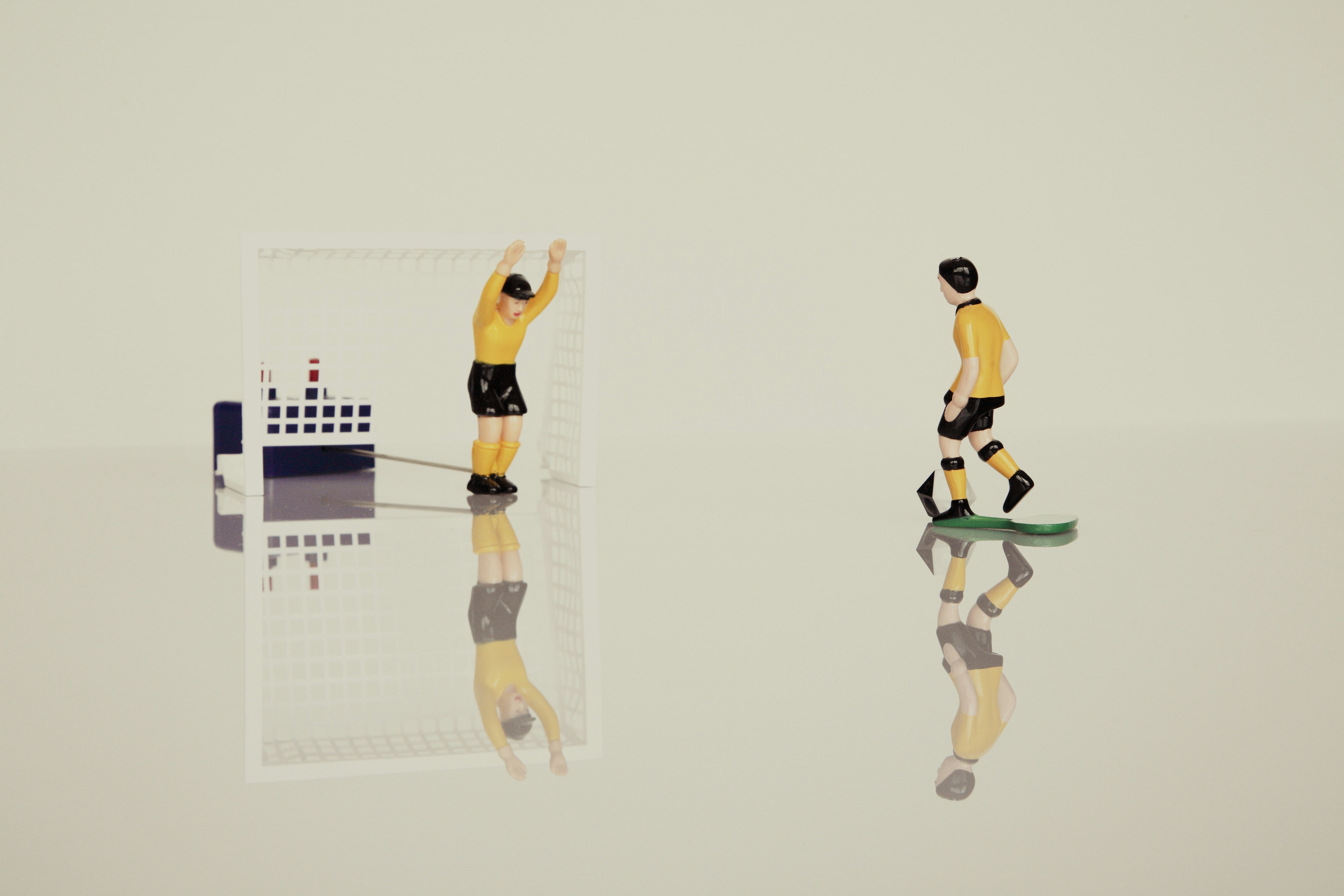 Tipp-Kick is a two-person game that represents a soccer simulation.